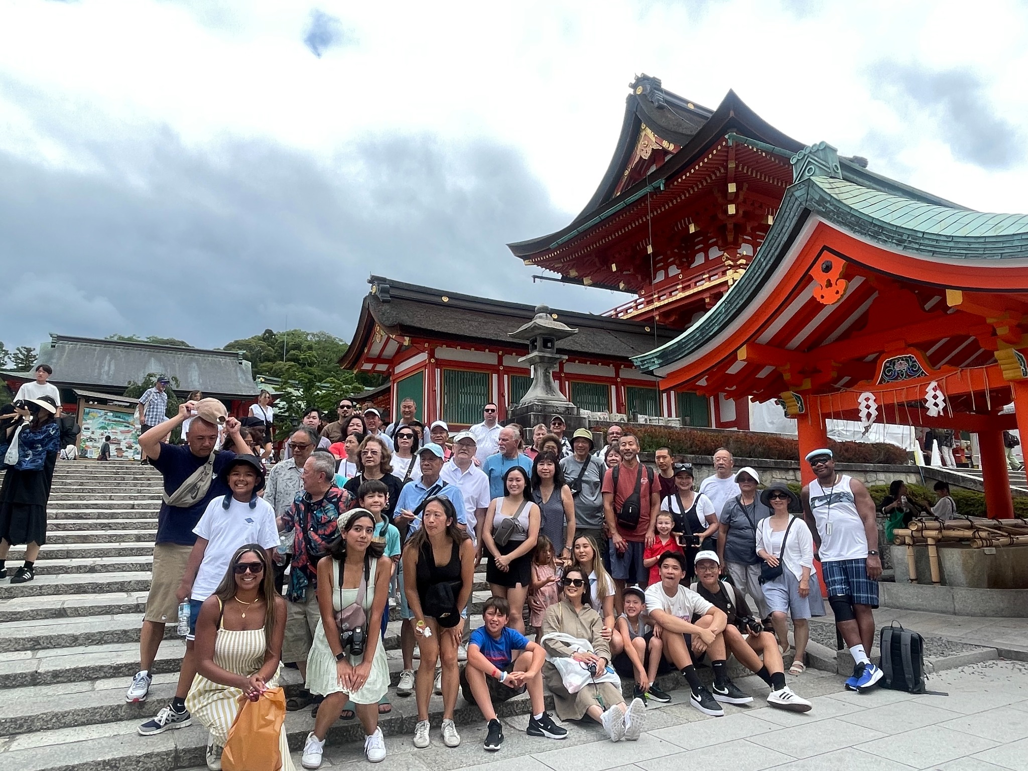 Guests gathered outside a Japanese shrine