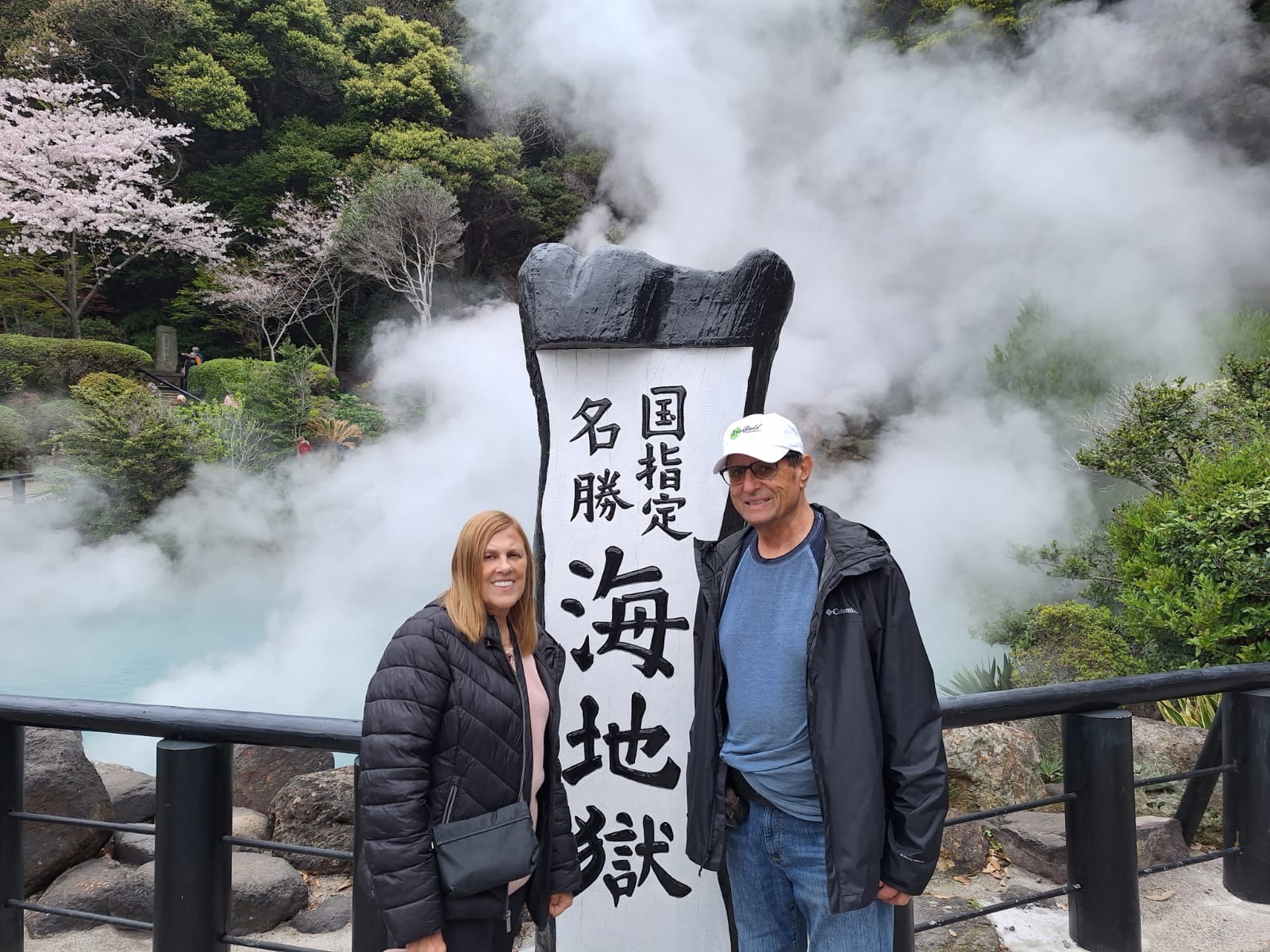 Guests visiting a steaming hot spring in Beppu