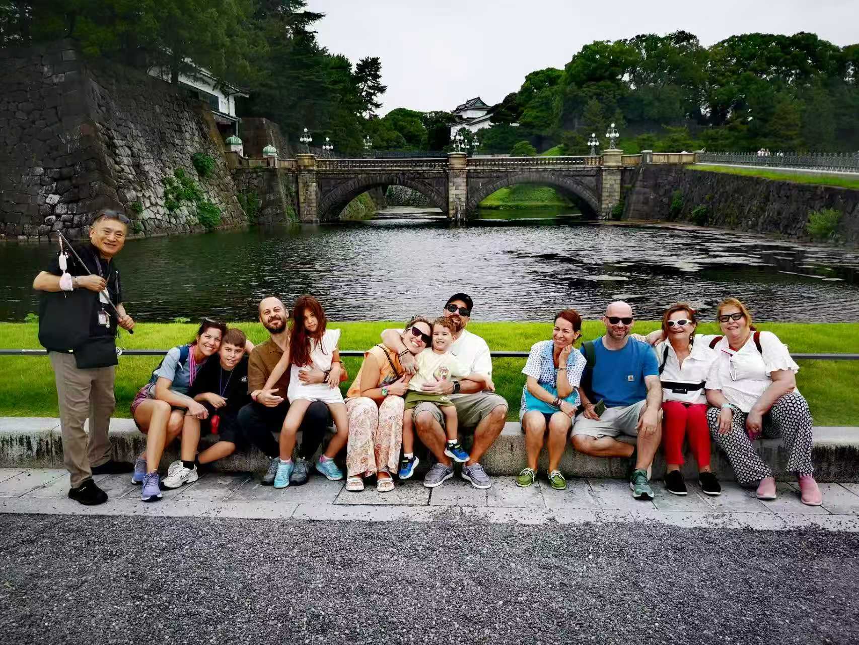 Guests relaxing beside the Imperial Palace moat